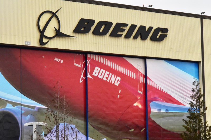 Boeing Co's logo is seen above the front doors of its largest jetliner factory in Everett