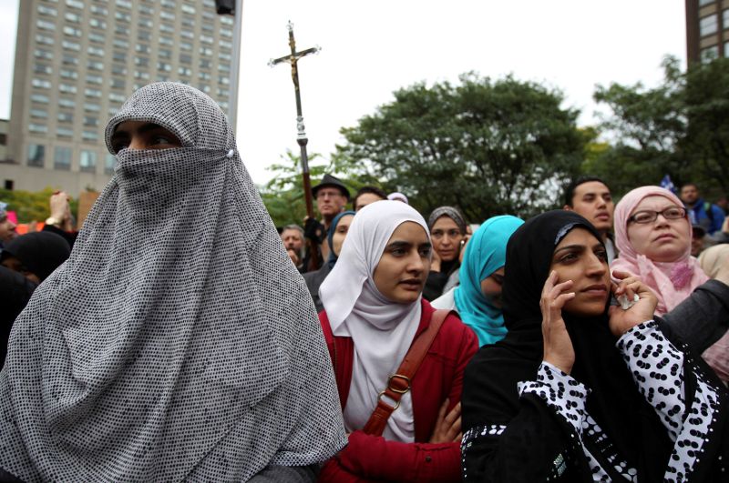 FILE PHOTO: Women in traditional garb gather to protest against Quebec's proposed Charter of Values in Montreal