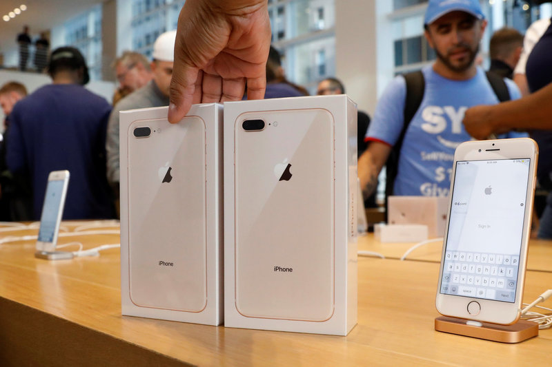 Two new iPhone 8's are placed out during a sale at the 5th Avenue Apple store in New York