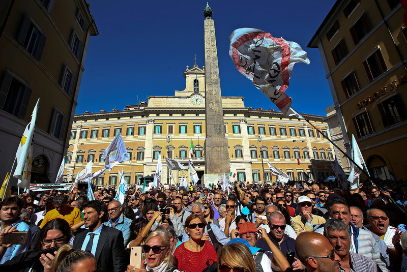 5-Star Movement supporters protest in front of Montecitorio government palace in Rome