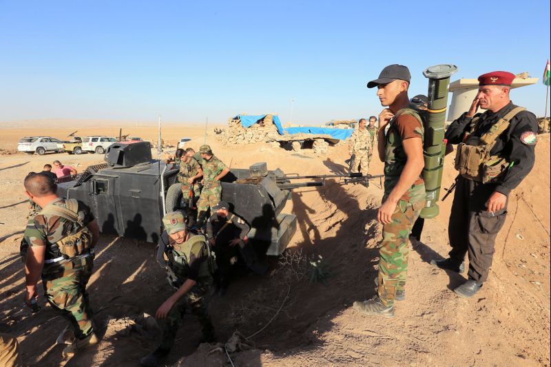 Kurdish Peshmerga fighters are seen in Karez area, west of Mosul