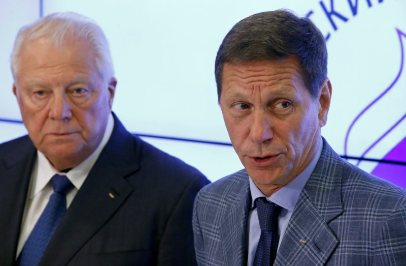 Russian Olympic Committee chief Zhukov and anti-doping commission head Smirnov attend a news conference following a meeting of the executive board of Russian Olympic Committee in Moscow