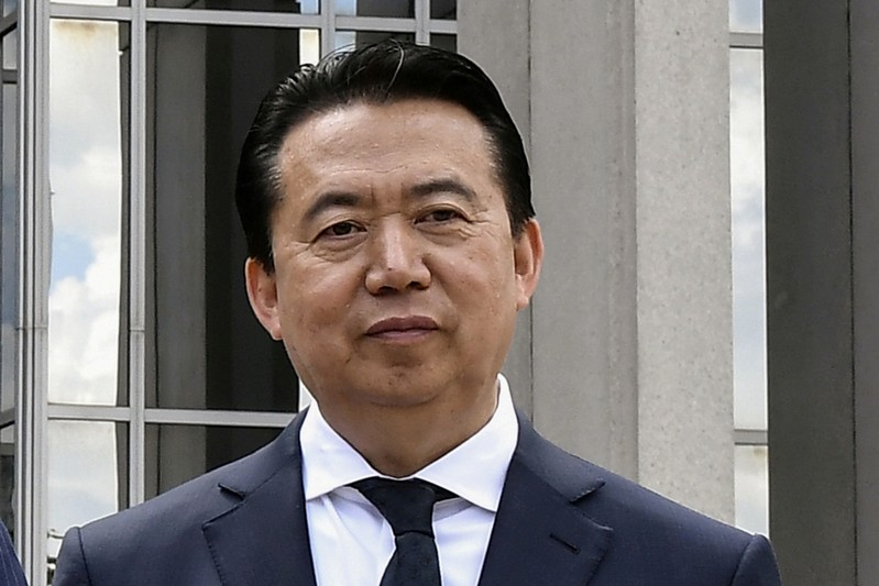 FILE PHOTO - Interpol President Meng Hongwei poses during a visit to the headquarters of International Police Organisation in Lyon