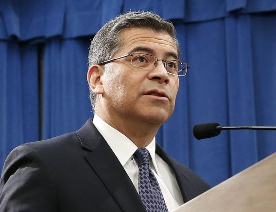 FILE - In this Feb. 15, 2019, file photo, California Attorney General Xavier Becerra speaks at a news conference in Sacramento, Calif. Becerra filed or joined at least nine lawsuits against the Trump administration on Tuesday, Jan. 19, 2021. The lawsuits were targeted at some of the Trump administration's roll backs of environmental regulations during the president's final weeks in office. Becerra, who has been nominated to lead the U.S. Department of Health and Human Services under President-elect Joe Biden, has filed well over 100 lawsuits against Trump since taking office. (AP Photo/Rich Pedroncelli, File)
