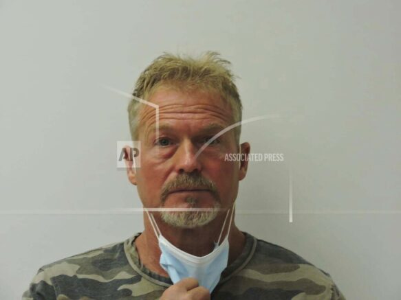 Photo provided by Chaffee County Sheriff’s Office shows Barry Morphew, arrested in connection with the disappearance of his wife, Suzanne Morphew, as the result of an ongoing investigation. (Chaffee County Sheriff’s Office via AP)
