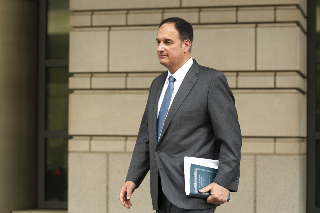 Michael Sussmann, a cybersecurity lawyer who represented the Hillary Clinton presidential campaign in 2016, leaves federal courthouse in Washington, Monday, May 16, 2022. A jury was picked Monday in the trial of a lawyer for the Hillary Clinton presidential campaign who is accused of lying to the FBI as it investigated potential ties between Donald Trump and Russia in 2016. (AP Photo/Manuel Balce Ceneta)