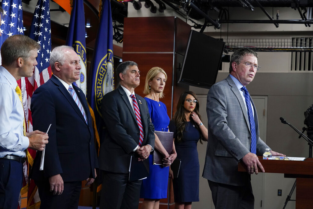 Republican members of the House Second Amendment Caucus, from left, Rep. Jim Jordan, R-Ohio, House Minority Whip Steve Scalise, R-La., Rep. Andrew Clyde, R-Ga., Rep. Mary Miller, R-Ill., Rep. Lauren Boebert, R-Colo., and Rep. Thomas Massie, R-Ky., talk to reporters as they criticize a series of Democratic measure to curb gun violence in the wake of the mass shootings at a school in Uvalde, Texas, and a grocery in Buffalo, N.Y., at the Capitol in Washington, Wednesday, June 8, 2022. (AP Photo/J. Scott Applewhite)