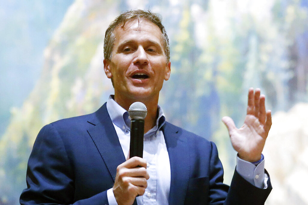 FILE - Former Missouri Gov. Eric Greitens, speaks at the Taney County Lincoln Day event at the Chateau on the Lake in Branson, Mo., April 17, 2021. Greitens, a Republican candidate for U.S. Senate in Missouri, has posted a campaign video ad on Twitter that shows him brandishing a long gun and declaring that he’s hunting RINOs, or Republicans In Name Only. (Nathan Papes/The Springfield News-Leader via AP, File)