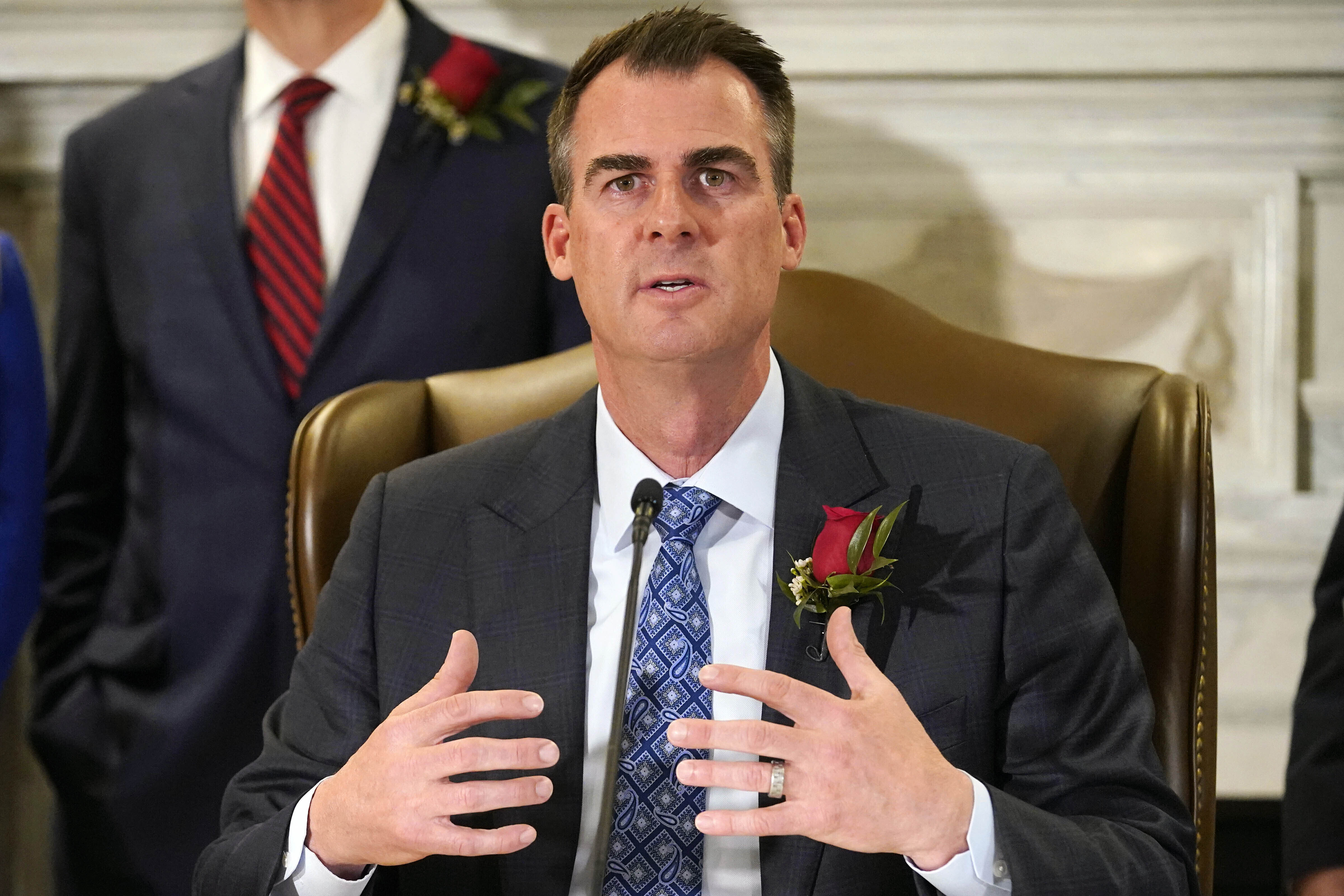 FILE - Oklahoma Gov. Kevin Stitt speaks, April 12, 2022, in Oklahoma City. The Oklahoma Legislature is returning Monday, June 13, to the Capitol for a special session to consider tax cuts the governor wants and how to allocate federal COVID-19 relief funds that were part of the American Rescue Plan Act. (AP Photo/Sue Ogrocki, File)