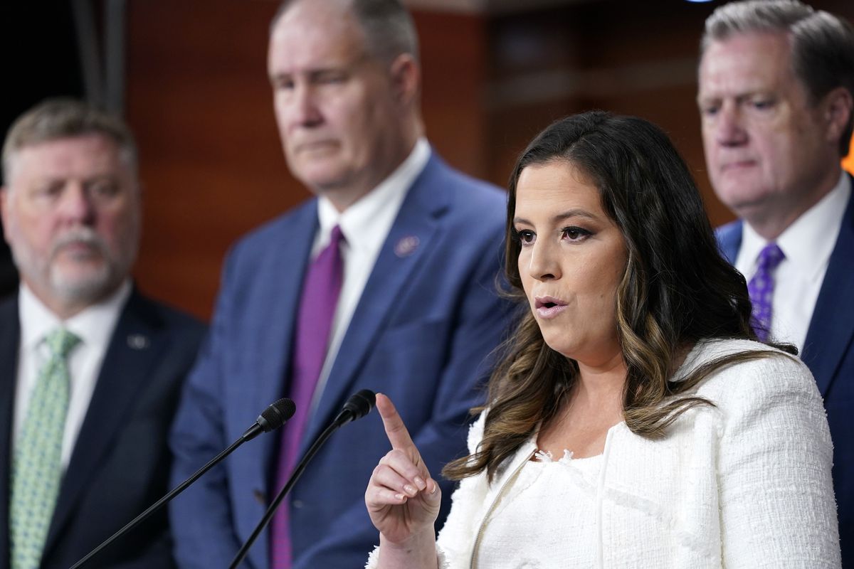 Rep. Elise Stefanik, backed by, from left, fellow Reps. Rick Crawford, Trent Kelly, and Mike Turner, speaks at a news conference on Capitol Hill on August 12 concerning the FBI serving a search warrant at Mar-a-Lago. Susan Walsh/AP