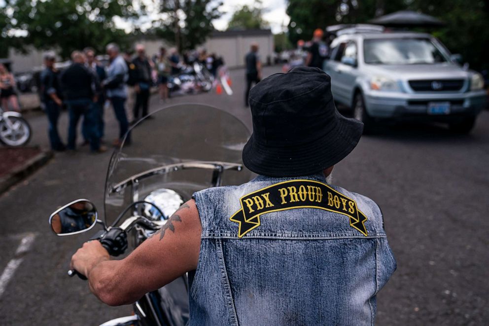 PHOTO: Flip Todd, a leader of the Portland Proud Boys, rides through a Proud Boy gathering, July 16, 2022, in Gladstone, Ore.