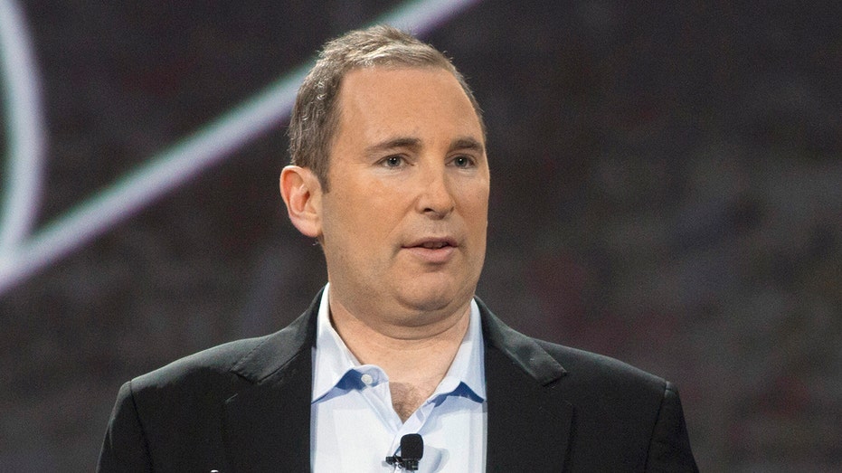 Amazon's Andy Jassy speaking while wearing a suit jacket