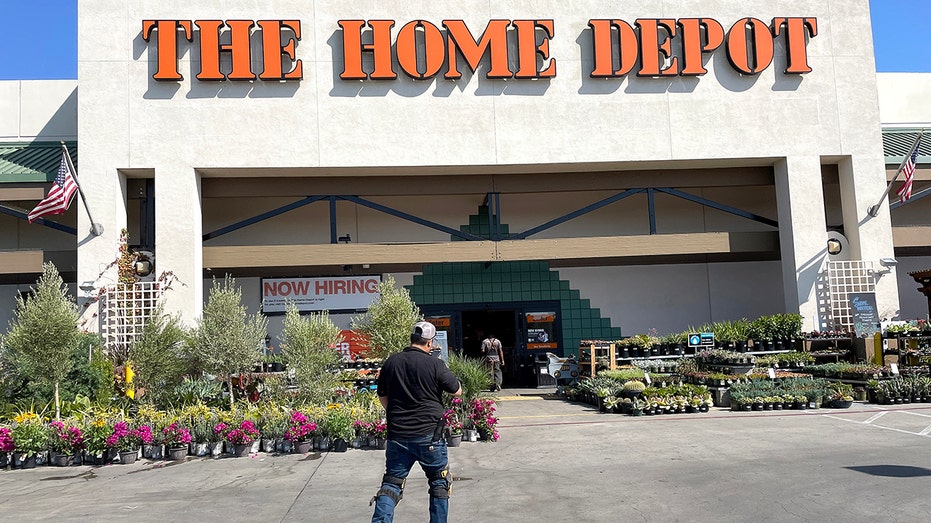 A customer heads into a Home Depot store in San Rafael, California on August 16, 2022