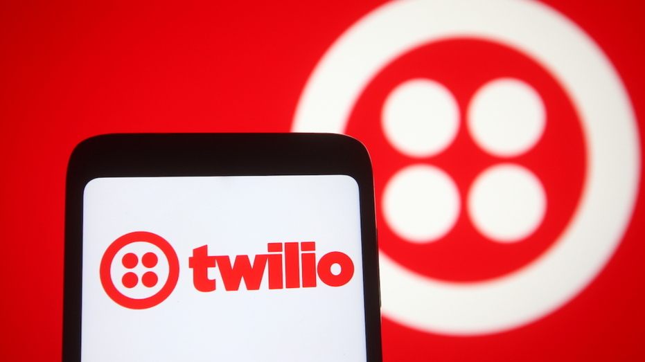 Twilio on a cell phone and computer screen
