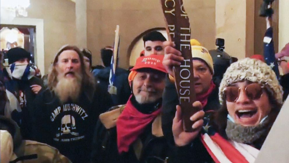PHOTO: A man wearing a hoodie that reads, "Camp Auschwitz" and "Work Brings Freedom," is pictured in an image made from ITV News video on Jan. 6, 2020, during the riot in the U.S. Capitol building in Washington, D.C.
