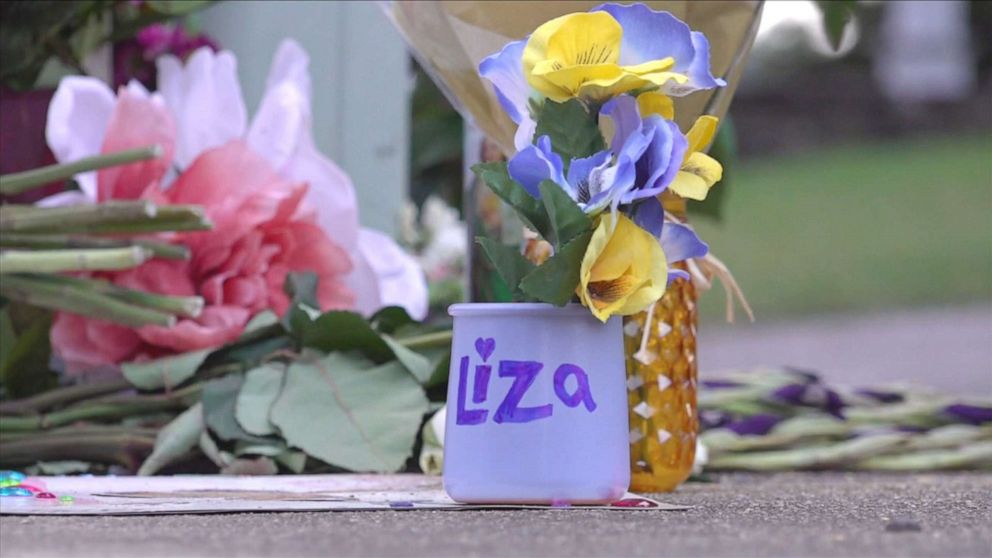 PHOTO: Flowers and candles are set in memory of 34-year-old Eliza Fletcher, who was abducted Sept. 6, 2022, near the University of Memphis in Memphis, Tenn. 