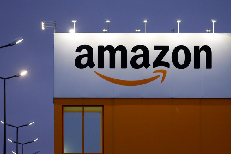 FILE PHOTO - The logo of Amazon is seen at the company logistics center in Lauwin-Planque, northern France