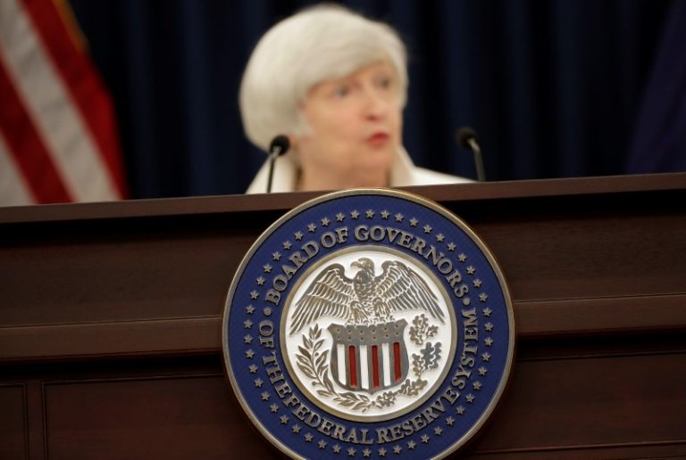 Bets on hawkish Fed flattens U.S. yield curve