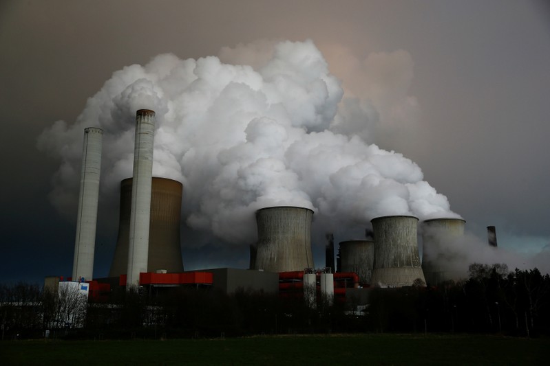 FILE PHOTO: Steam rises from the cooling towers of the coal power plant of RWE in Niederaussem