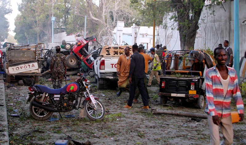 General view shows the scene of a suicide car bombing at the gate of Naso Hablod Two Hotel in Mogadishu