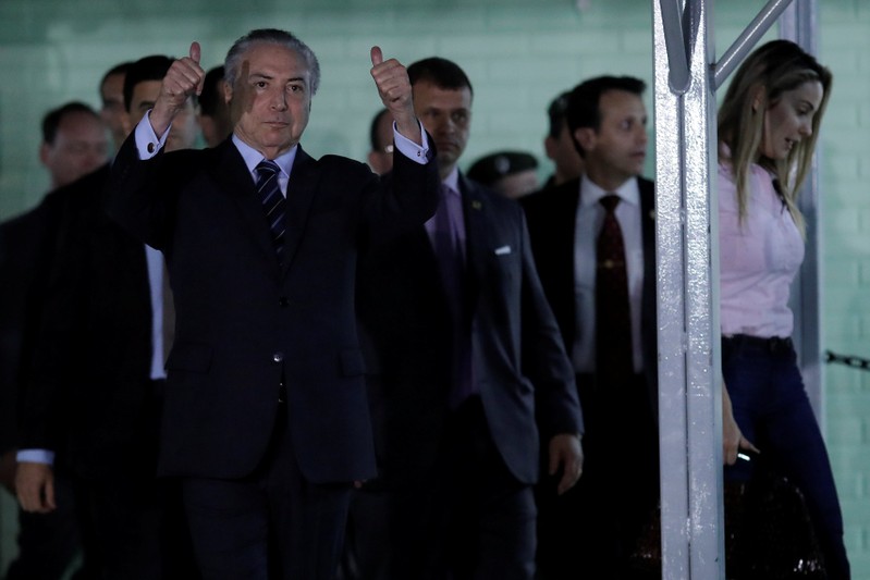 Brazil's President Michel Temer leaves a hospital in Brasilia