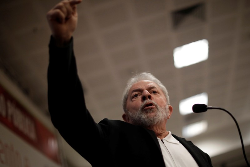 Former Brazil's President Luiz Inacio Lula da Silva gestures during a seminar on public education in Brasilia