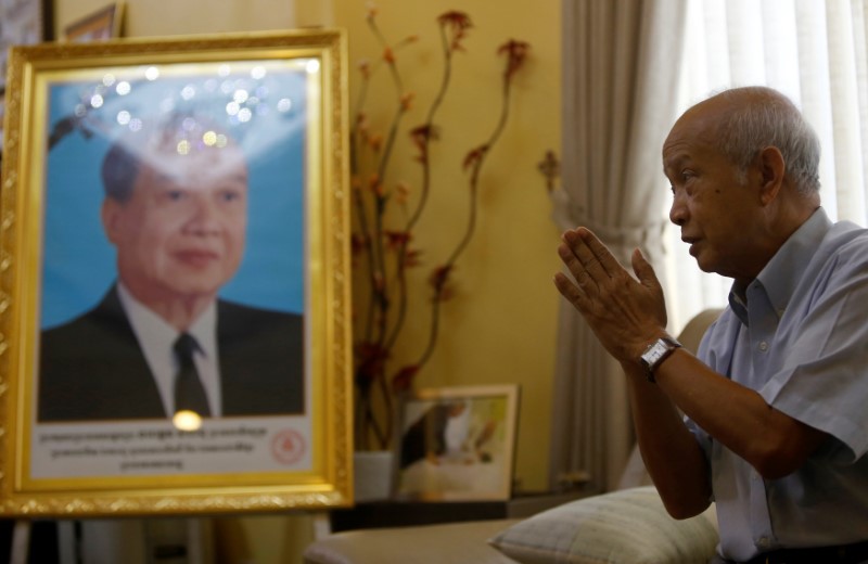 Prince Norodom Ranariddh gestures during an interview with Reuters at his home in central Phnom Penh