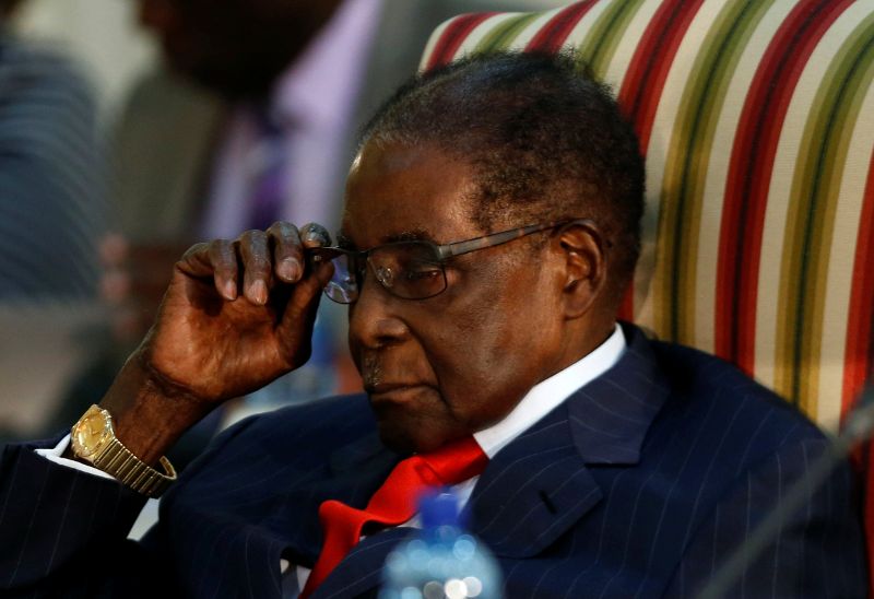 Zimbabwean President Mugabe gestures as he attends the 2nd Session of the South Africa-Zimbabwe Bi-National Commission in Pretoria