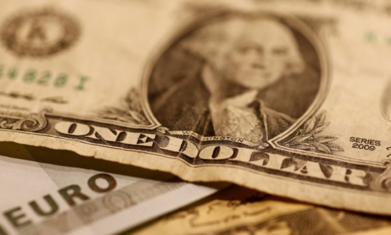 Dollar edges down as attention turns to Fed leadership