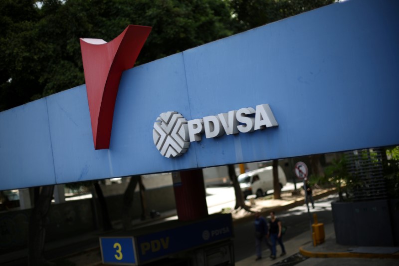 FILE PHOTO: The corporate logo of the state oil company PDVSA is seen at a gas station in Caracas