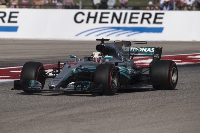 Hamilton wins U.S. GP but made to wait for title