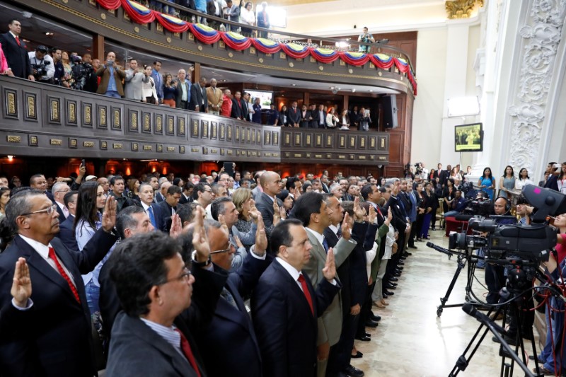 Newly elected governors of the National Constituent Assembly are seen during the swearing in ceremony at the Palacio Federal Legislativo, in Caracas