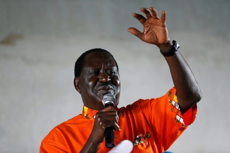 Kenyan opposition leader Raila Odinga of the National Super Alliance (NASA) coalition addresses his supporters during a church service in Kawangware slums in Nairobi