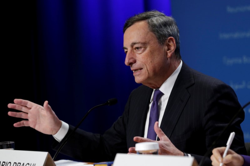 European Central Bank President Mario Draghi speaks at a news conference during the IMF/World Bank annual meetings in Washington