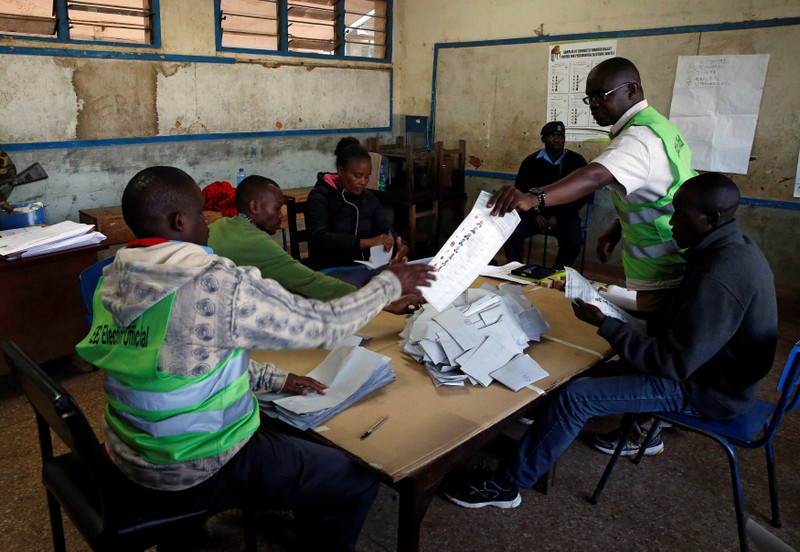 Election officials count ballot papers during Kenya's presidential election in Nairobi