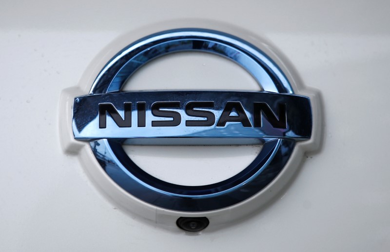 FILE PHOTO: The Nissan company logo is seen on a modified Nissan Leaf, driverless car, during its first demonstration on public roads in Europe, in London