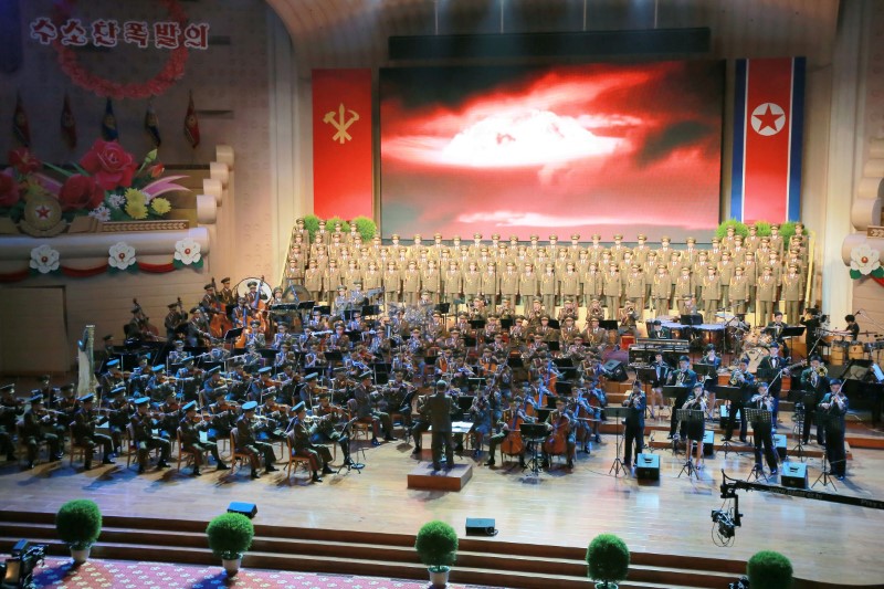 People perform for North Korean leader Kim Jong Un during a celebration for nuclear scientists and engineers who contributed to a hydrogen bomb test, in this undated photo released by North Korea's Korean Central News Agency (KCNA)