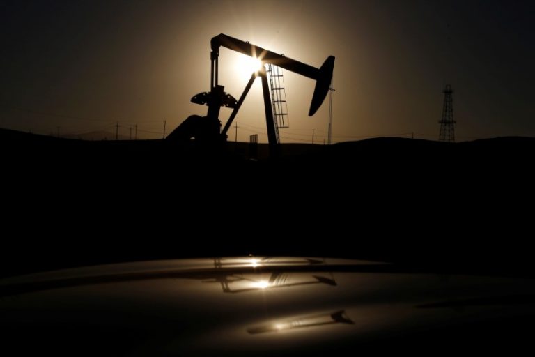 Oil drops on rising U.S. crude inventories, OPEC seen to extend cuts