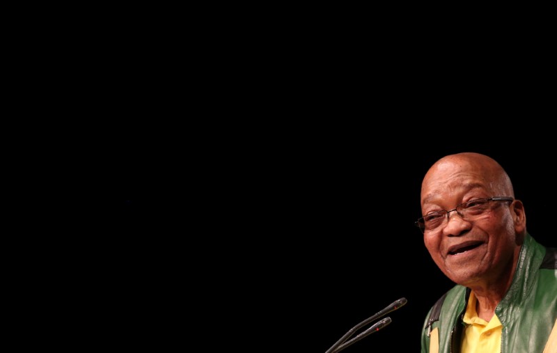 FILE PHOTO: South Africa's President Zuma gestures at the ANC in Soweto