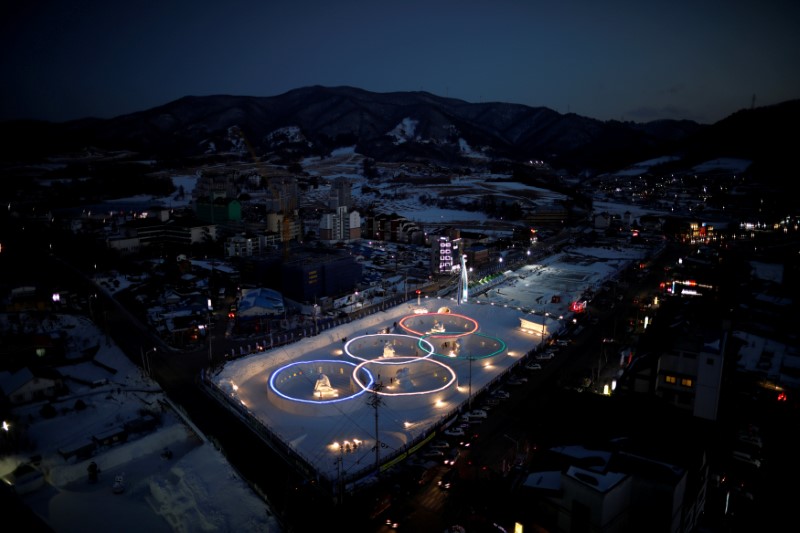 FILE PHOTO: An ice sculpture of the Olympic rings is illuminated during the Pyeongchang Winter Festival