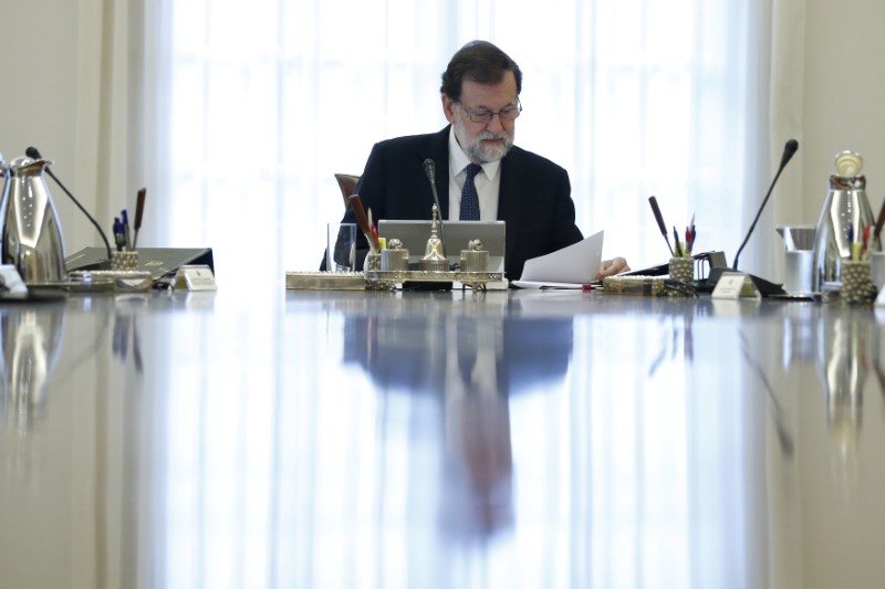 Spain's Prime Minister Mariano Rajoy heads a special cabinet meeting at the Moncloa Palace in Madrid