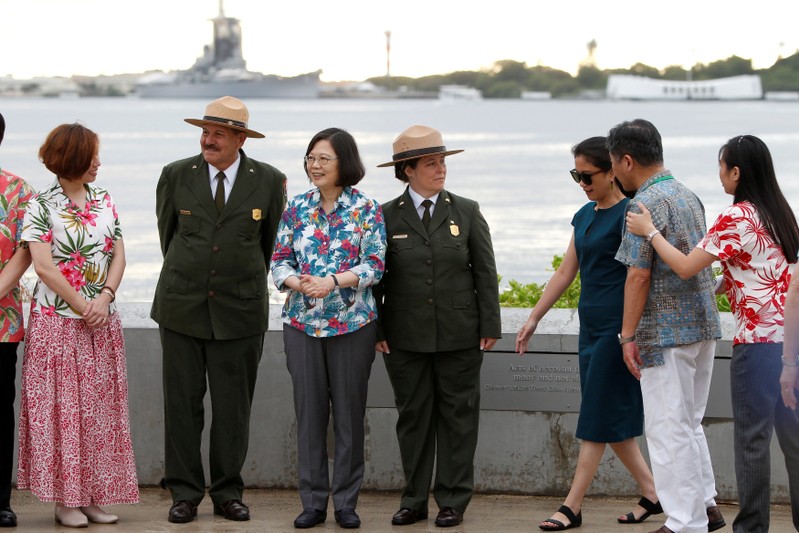 Taiwan's President Tsai Ing-wen stands with delegates and park service members at the USS Arizona Memorial at Pearl Harbor near Honolulu, Hawaii