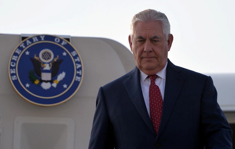 U.S. Secretary of State Rex Tillerson comes down from plane upon his arrival at Pakistan's Nur Khan military airbase in Islamabad