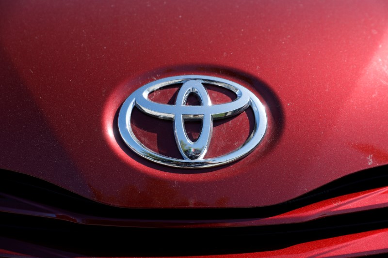 A Toyota logo is seen on a car at City Toyota in Daly City, California
