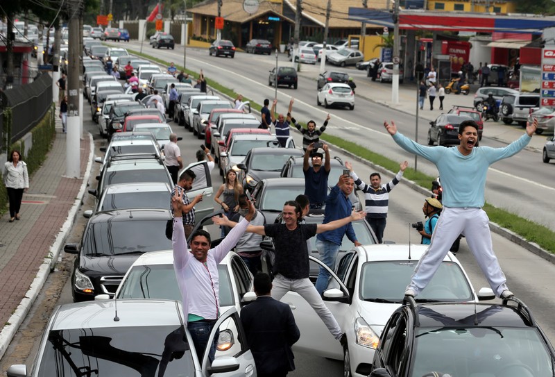 Uber drivers protest against legislation threatening the company's business model in Sao Paulo