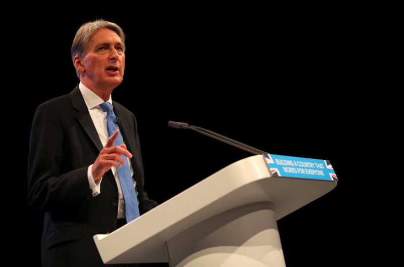 Britain's Chancellor of the Exchequer Philip Hammond speaks at the Conservative Party's conference in Manchester