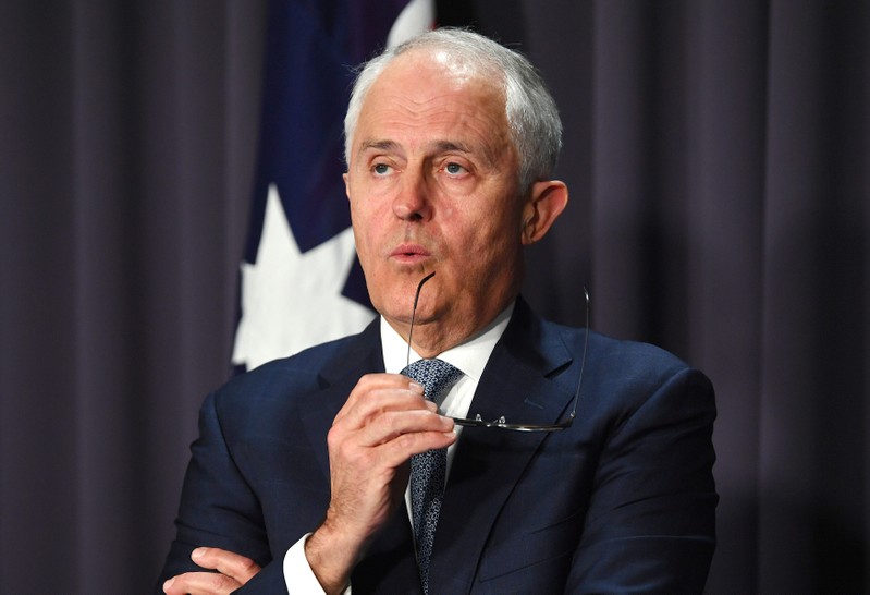 Australia's Prime Minister Malcolm Turnbull reacts during a media conference at Parliament House in Canberra