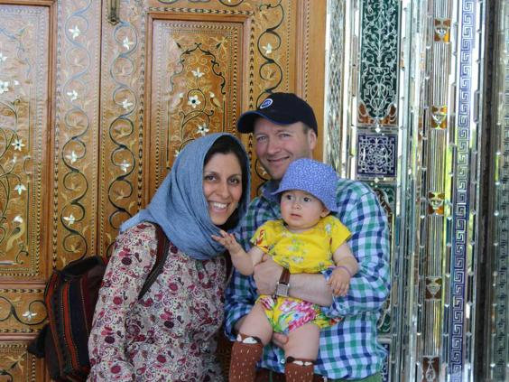 Iranian-British aid worker Nazanin Zaghari-Ratcliffe is seen with her husband Richard Ratcliffe and her daughter Gabriella in an undated photograph handed out by her family
