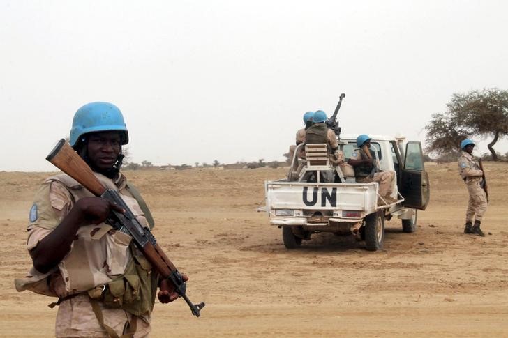 U.N. peacekeepers stand guard in the northern town of Kouroume