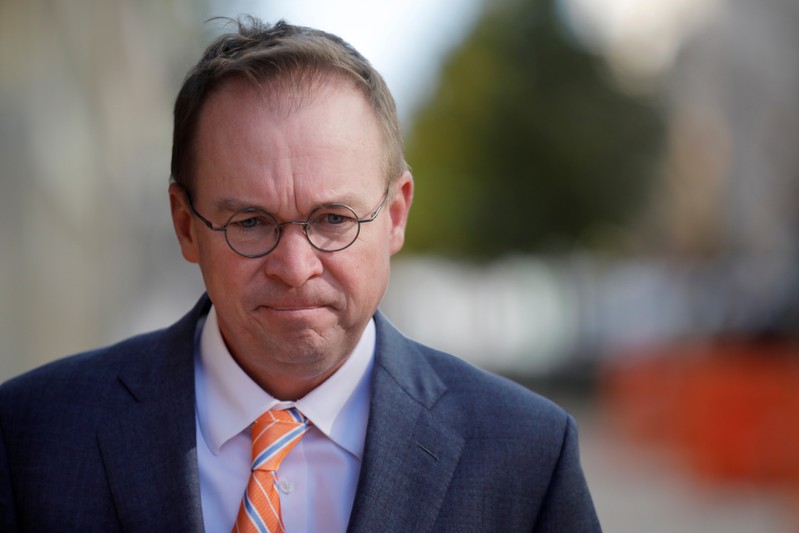 Office of Management and Budget Director Mulvaney leaves the Consumer Financial Protection Bureau building after a meeting in downtown Washington D.C.
